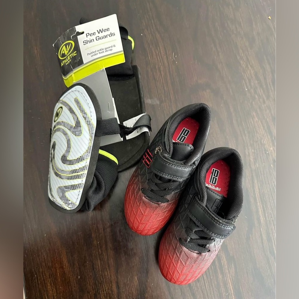 Soccer cleats and shin pads (toddler 8)